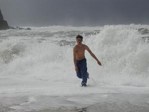 Mark chased by a wave