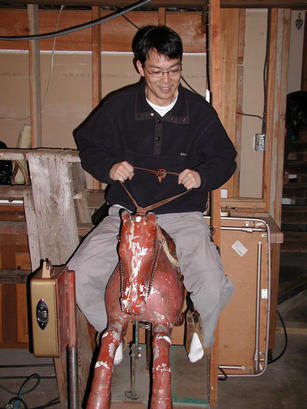 Billy mounts the horse
